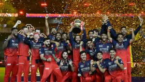 RCB IPL 2026 Champions - Virat Kohli lifting trophy